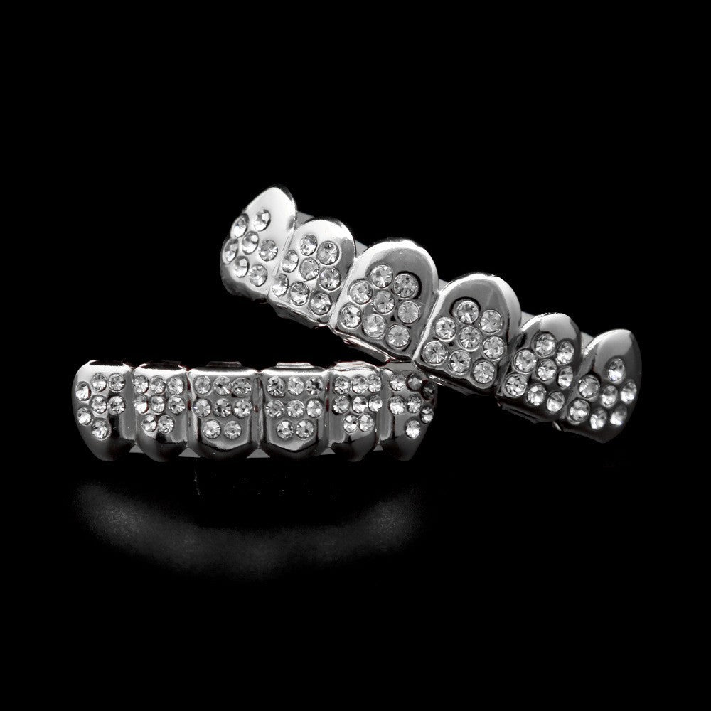 Hip-hop diamond-encrusted and gold-plated teeth grillz